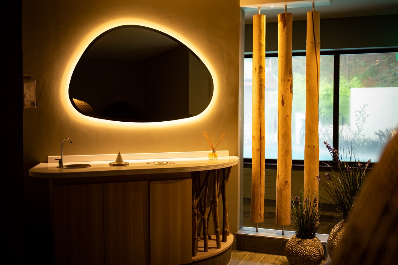 Two people sat by the pool.